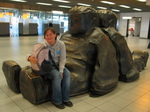 28421 Jenni sitting on resting statues.jpg